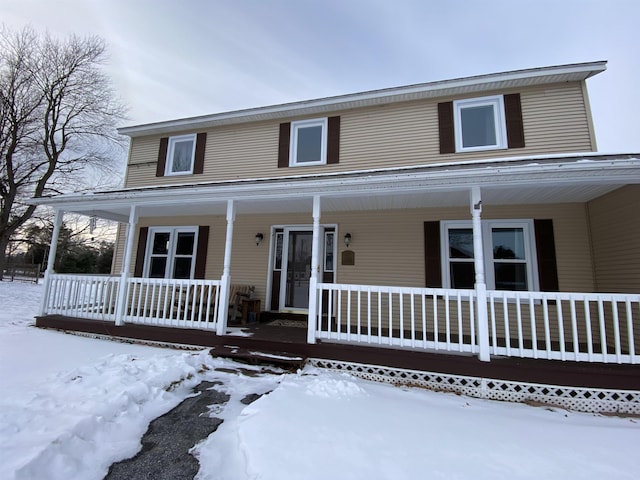 country-style home with covered porch