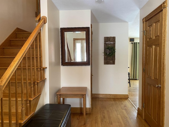 hall featuring hardwood / wood-style floors