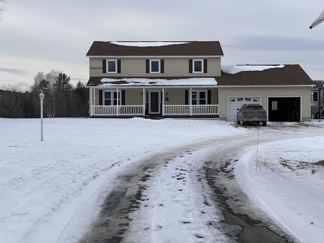 front facade featuring a porch and a garage