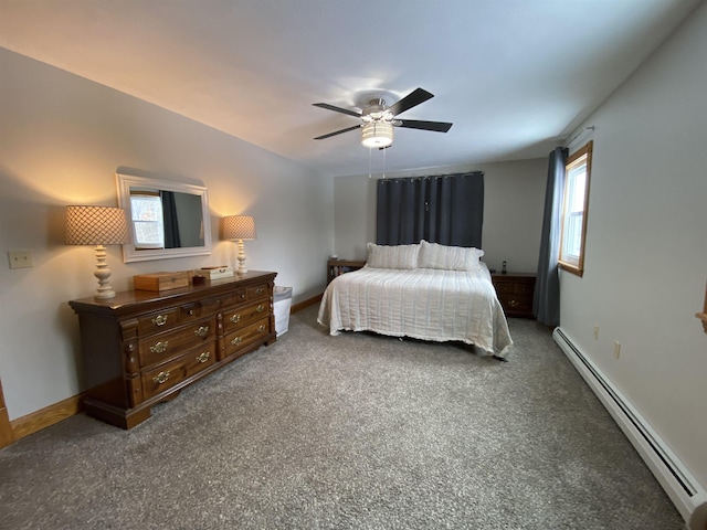 carpeted bedroom with ceiling fan and a baseboard radiator