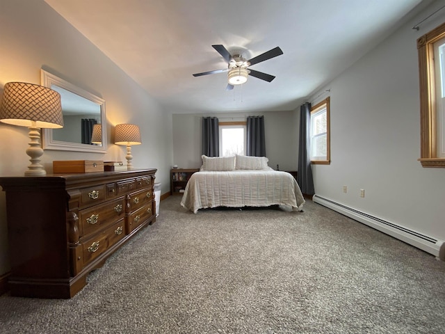 bedroom featuring a baseboard heating unit, ceiling fan, and carpet flooring