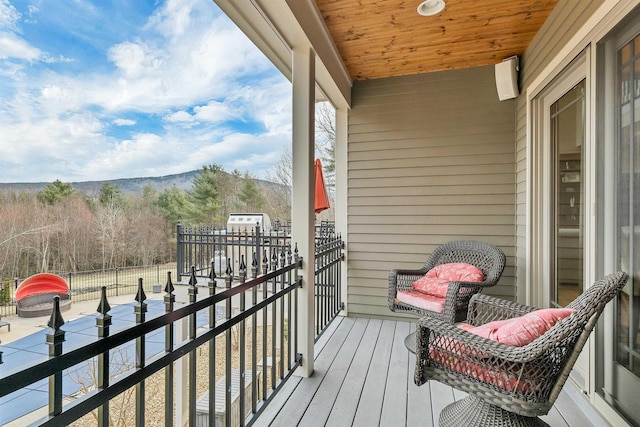 balcony featuring a mountain view