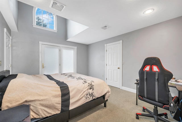 bedroom with light carpet