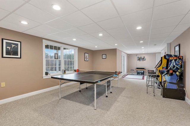 recreation room featuring light colored carpet