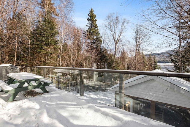 view of snow covered deck