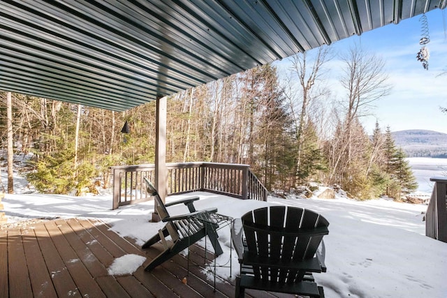 view of snow covered deck