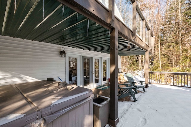 deck with a hot tub