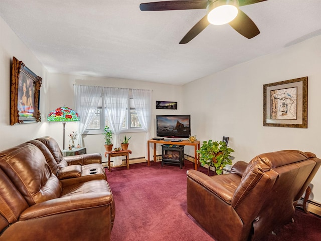 living room featuring carpet floors, baseboard heating, and ceiling fan