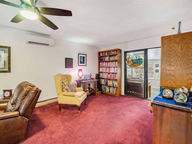 sitting room with carpet floors, a baseboard heating unit, a wall unit AC, and ceiling fan