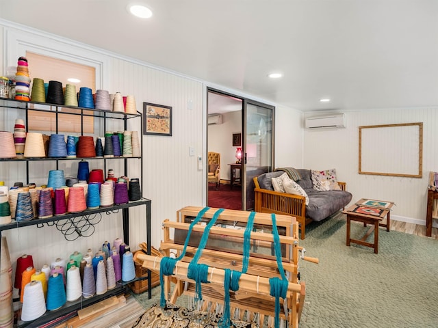 interior space featuring hardwood / wood-style flooring and a wall mounted air conditioner