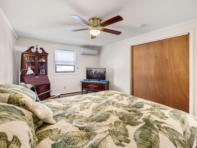 bedroom with an AC wall unit, a closet, ornamental molding, and ceiling fan