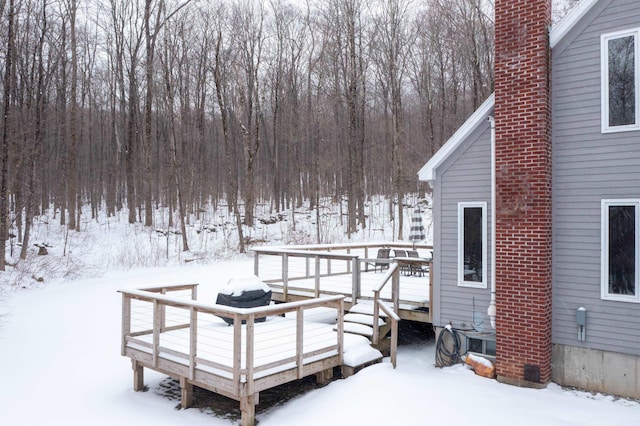 view of snow covered deck