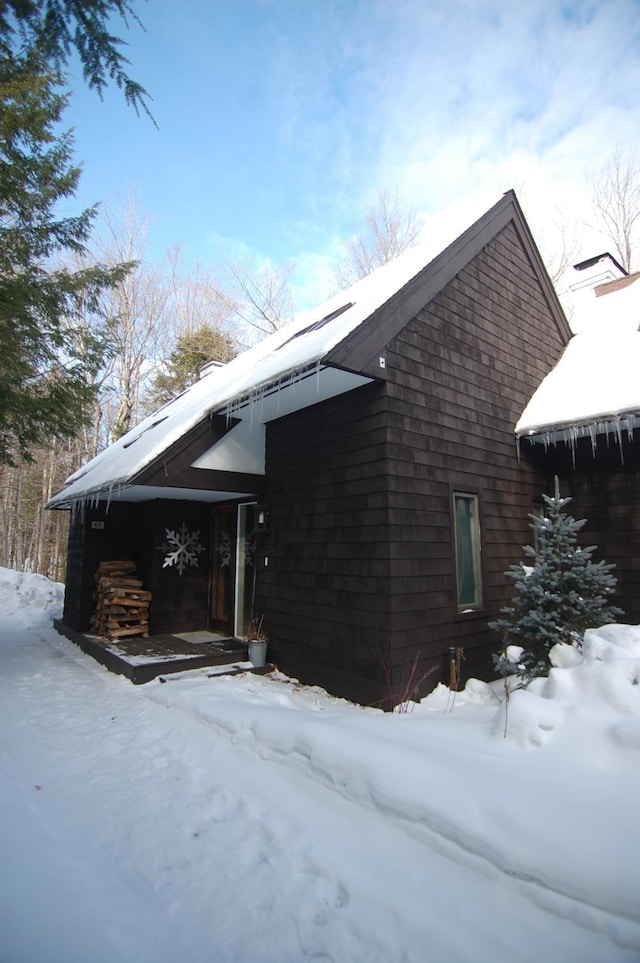 view of snow covered property