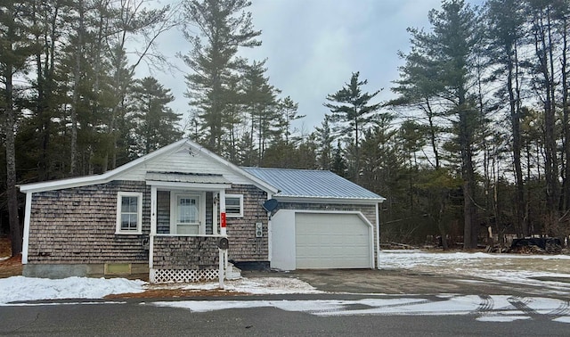 view of front of home with a garage