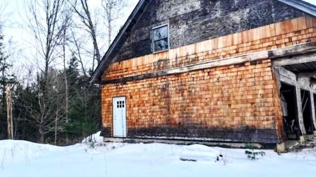 view of snow covered property