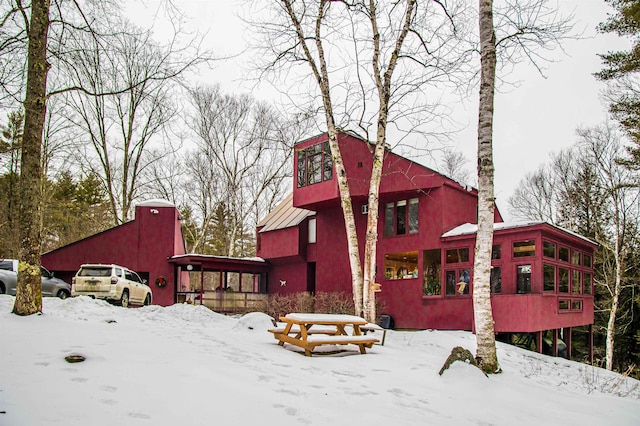 view of snow covered property