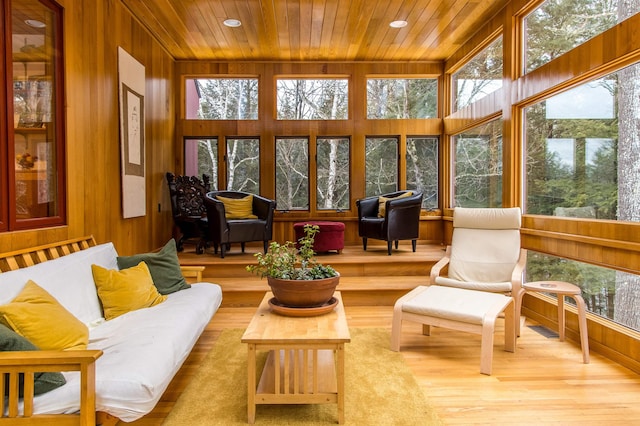 sunroom / solarium featuring wood ceiling