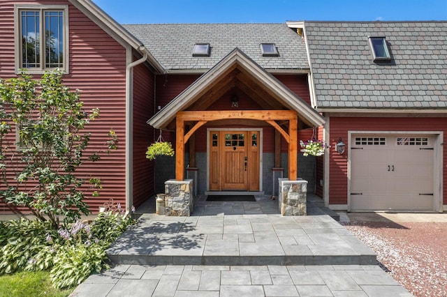 property entrance with a garage