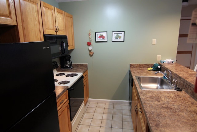 kitchen featuring light tile patterned floors, sink, and black appliances