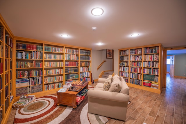 sitting room with hardwood / wood-style floors