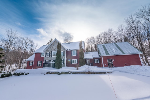 view of snow covered property