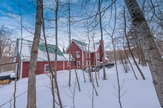 view of yard covered in snow