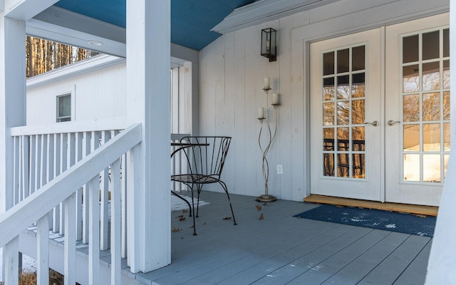 wooden terrace featuring french doors