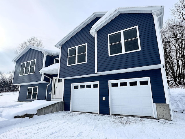 view of front of home with a garage