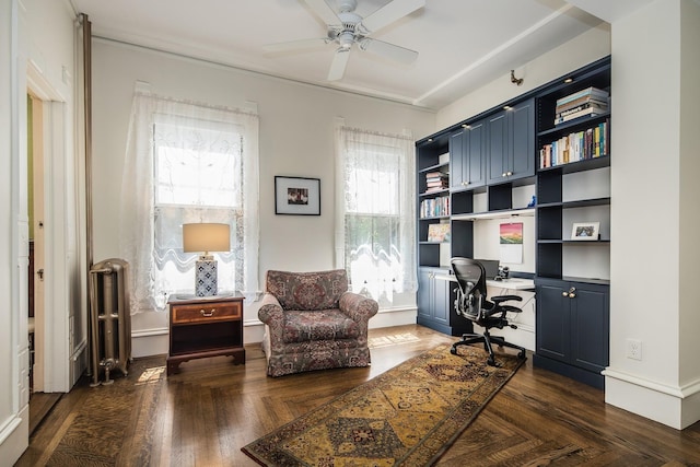 home office with ceiling fan and radiator heating unit