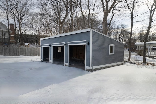 view of snow covered garage