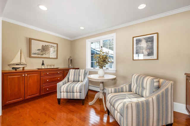 sitting room featuring dark hardwood / wood-style flooring and ornamental molding