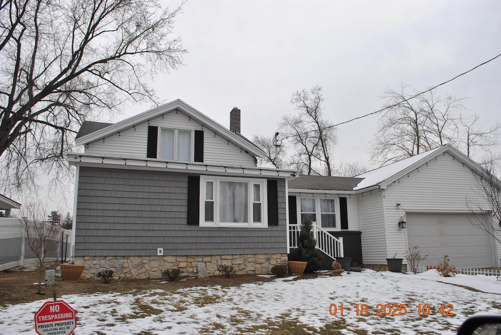 view of front of property featuring a garage