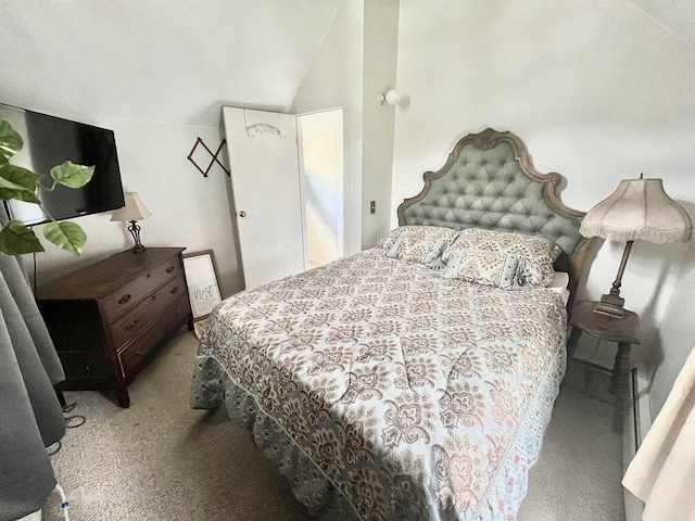 bedroom featuring light colored carpet