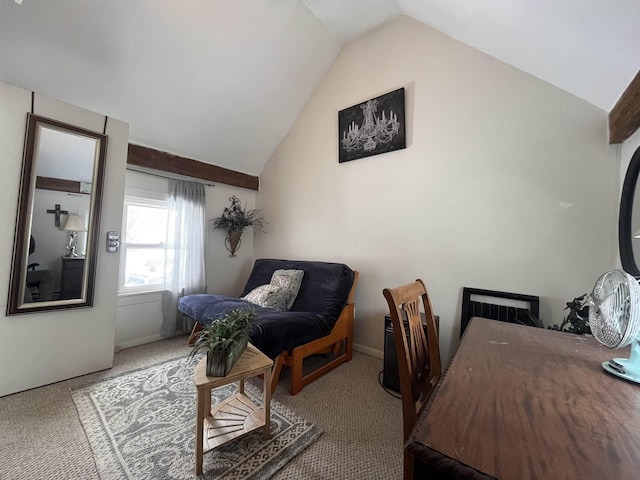 carpeted home office featuring vaulted ceiling