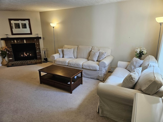 living room featuring a textured ceiling, a brick fireplace, carpet flooring, and baseboard heating