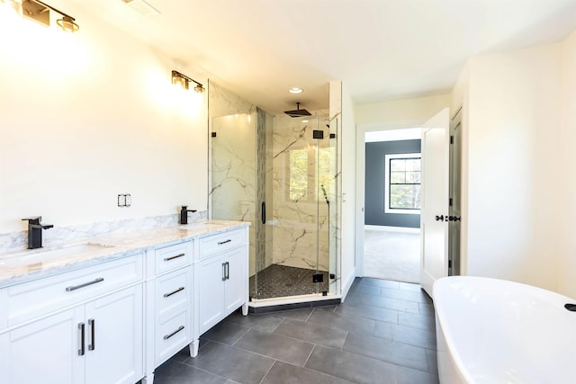 bathroom with vanity, tile patterned floors, and independent shower and bath