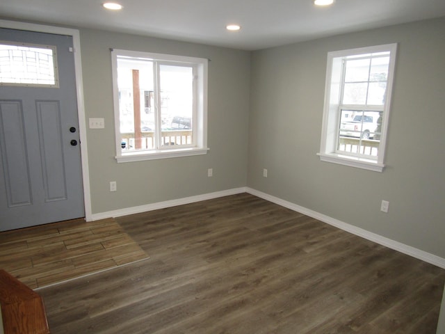 entrance foyer with dark hardwood / wood-style flooring