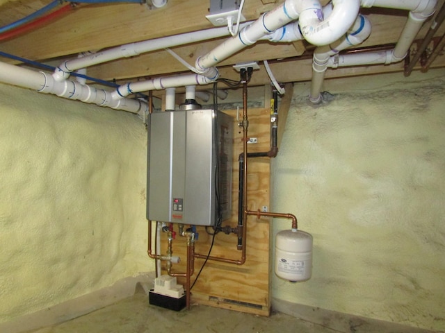 utility room with water heater