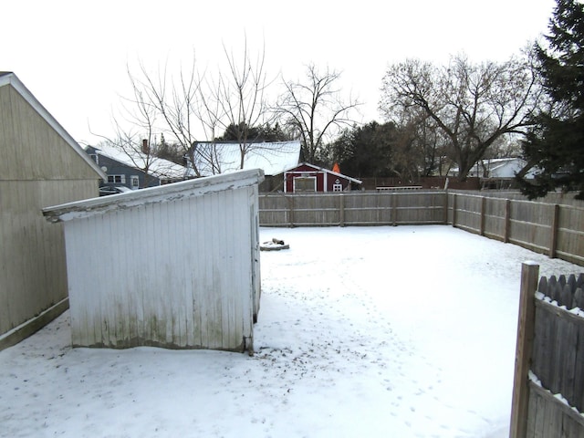 view of yard covered in snow