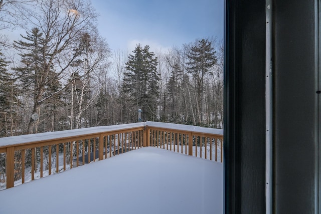 view of snow covered deck