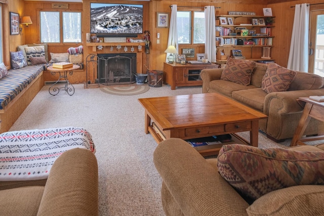 living room with carpet flooring and wooden walls