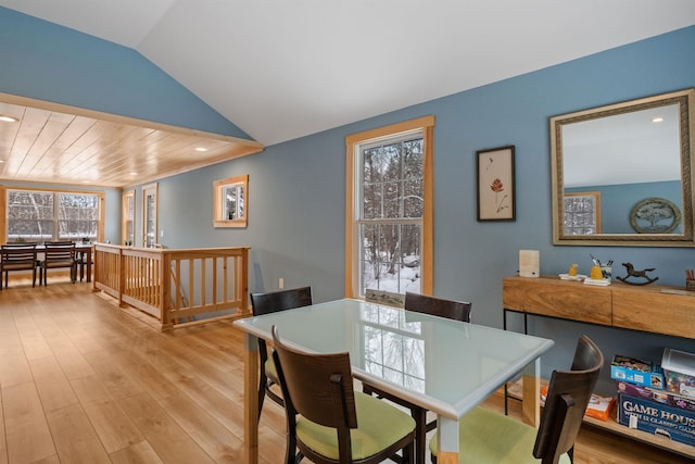 dining space with lofted ceiling, wooden ceiling, light wood-type flooring, and recessed lighting