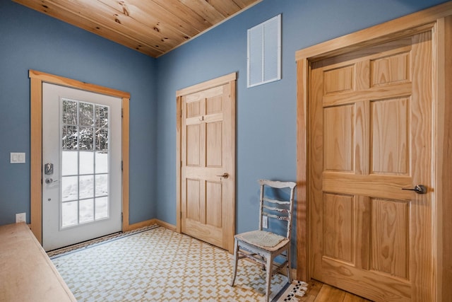 entryway with wooden ceiling and visible vents