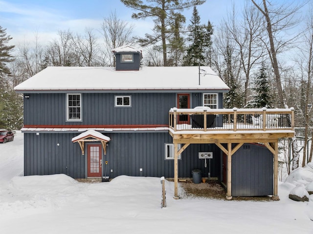 view of front of home featuring a wooden deck