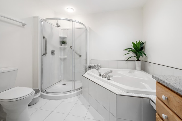 full bathroom featuring tile patterned floors, toilet, independent shower and bath, and vanity