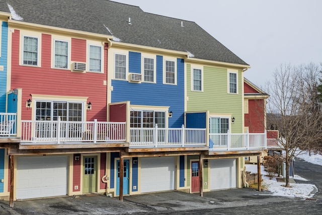 rear view of house featuring cooling unit