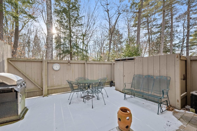 view of patio with a grill