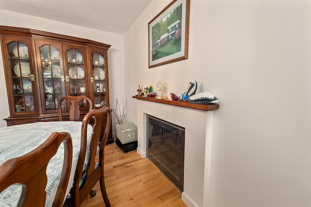 dining space featuring light wood-type flooring