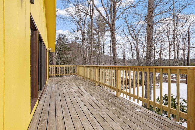 view of snow covered deck