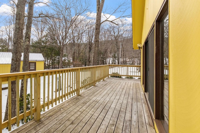 view of snow covered deck